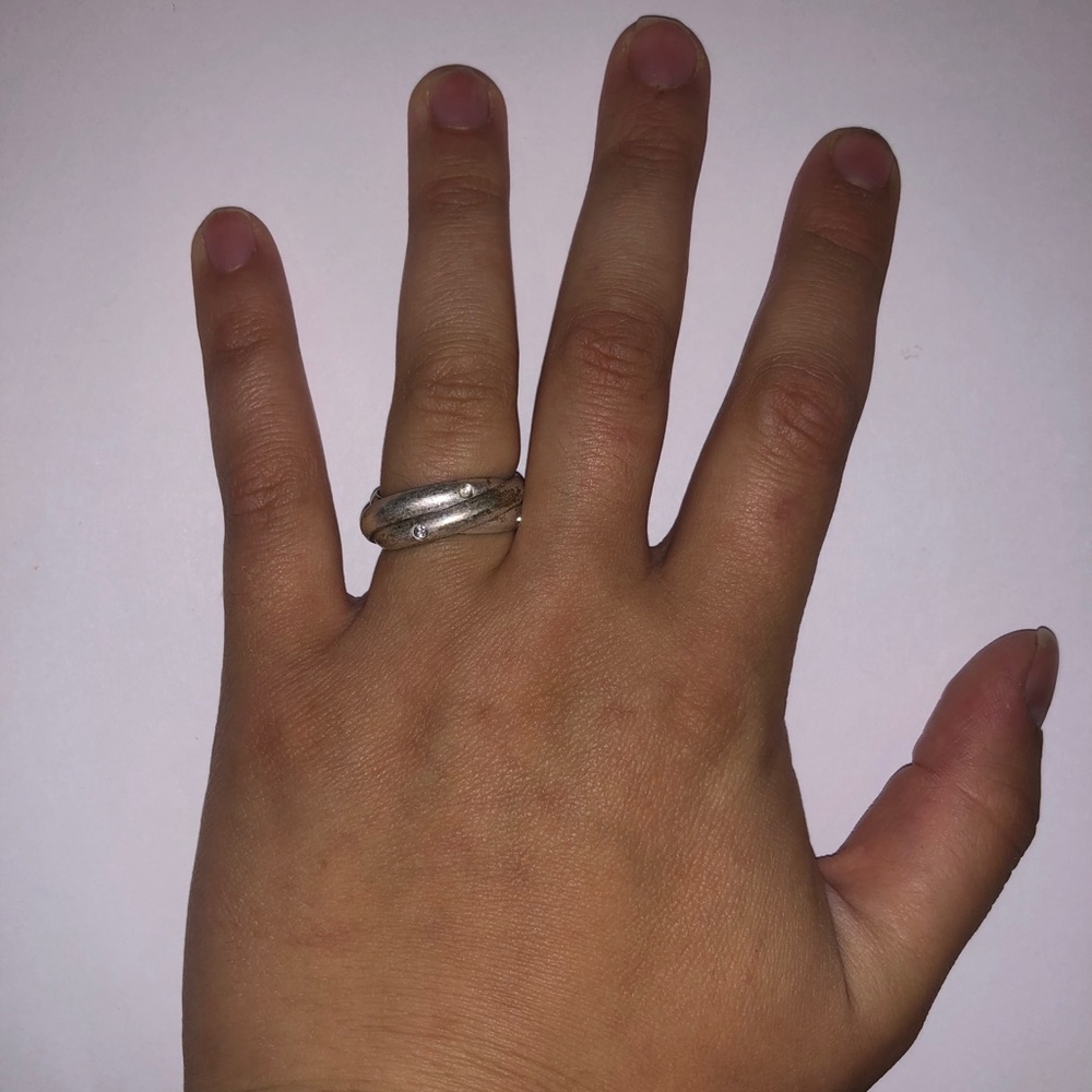 Jewelry: Intertwined Silver Rings with Rhinestones